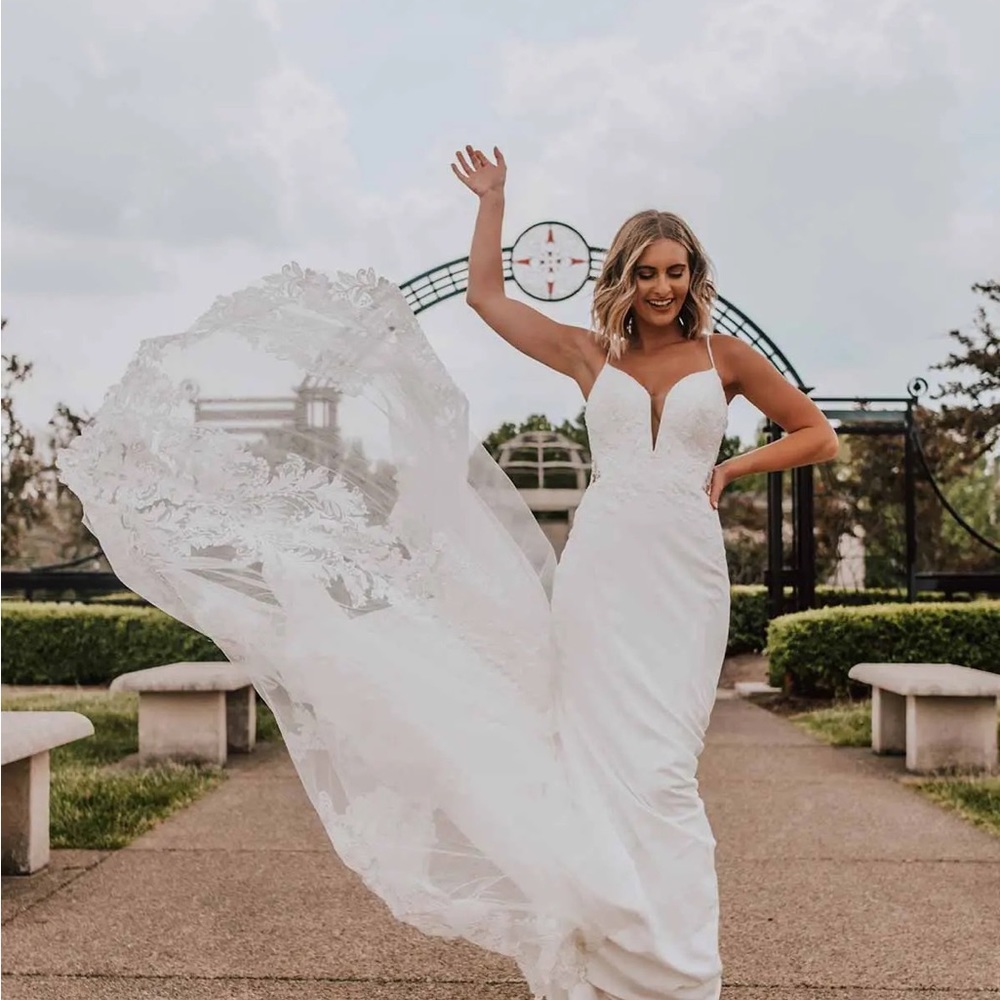 Brand new, in altered wedding dress